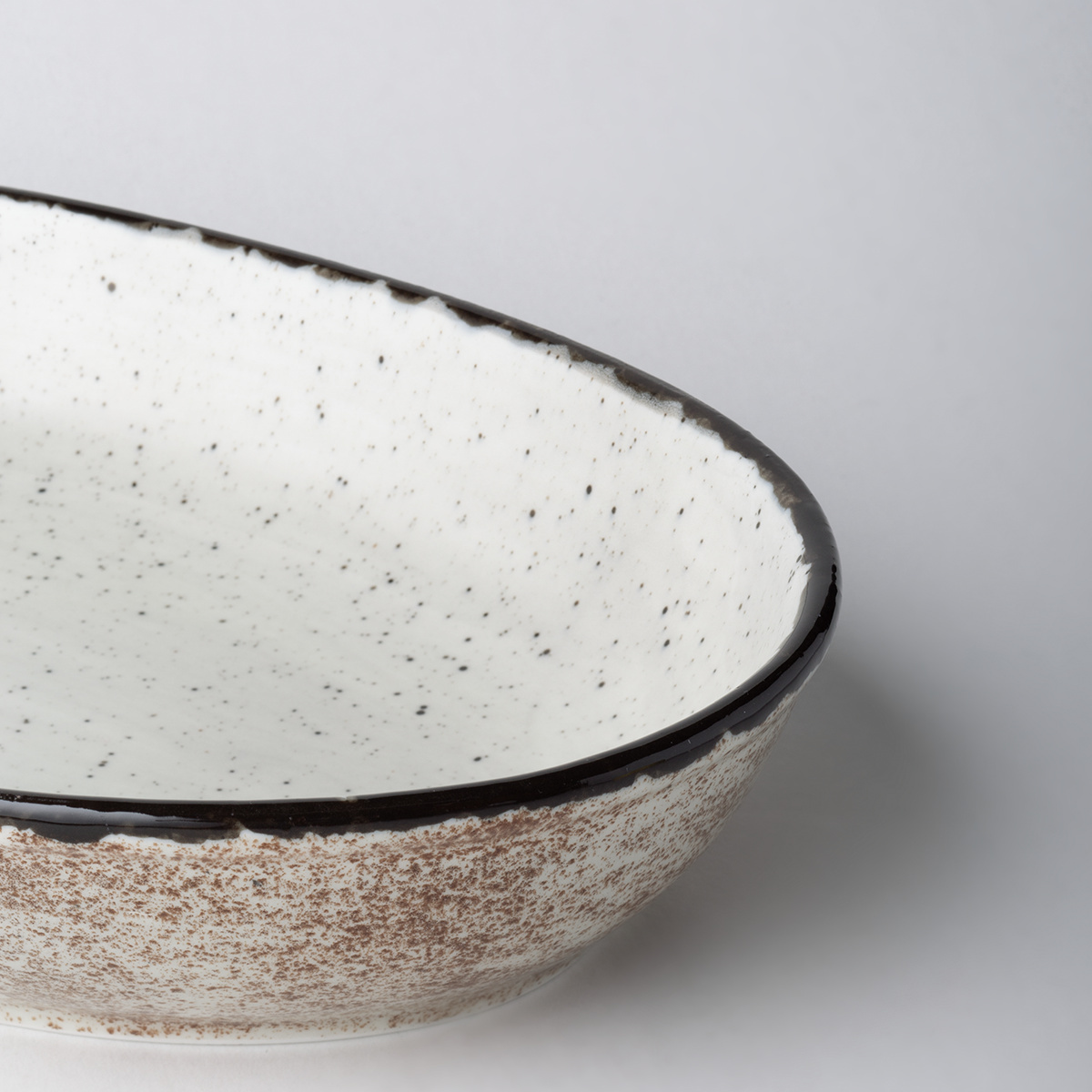 Plat à four ovale 32 x 23 x 4,5 cm - Elements gris clair moucheté
